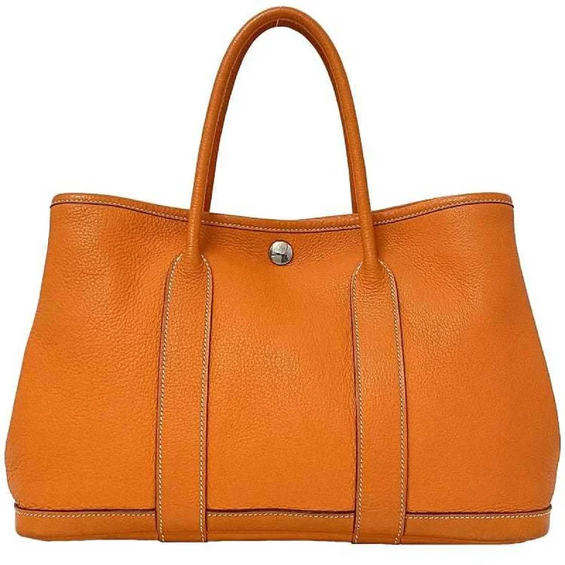 gold suede tote bag-gold suede tote bagHermes Garden  Leather Handbag Tote Bag (Pre-Owned)